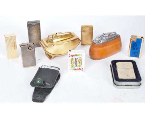 A collection of vintage 20th century lighters comprising of table examples, zippo, enamel examples and more.&nbsp;