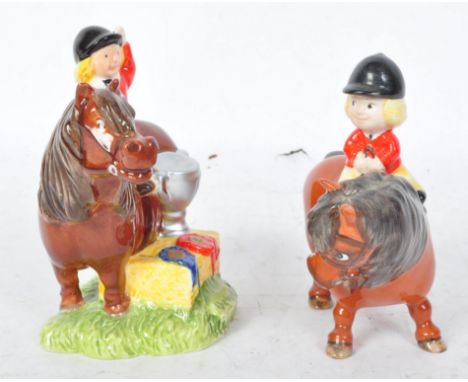 Two vintage 20th century Beswick Norman Thelwell china figurines to include a pony and rider receiving show medals and anothe