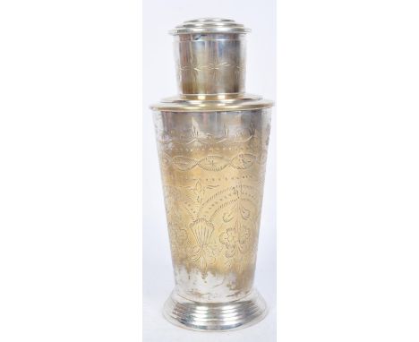 A 20th century chrome silver plated cocktail shakers with incised floral decoration and decorative pierced filter. Ring mark 