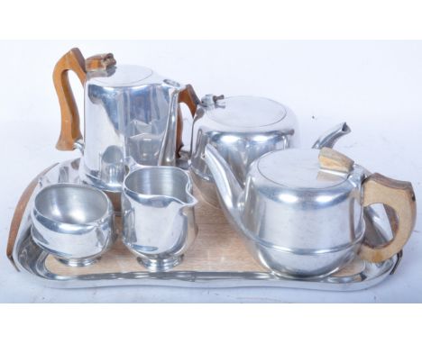 A vintage retro mid 20th century circa. 1950's Picquot Ware magnesium-aluminium alloy six piece tea service comprising of two