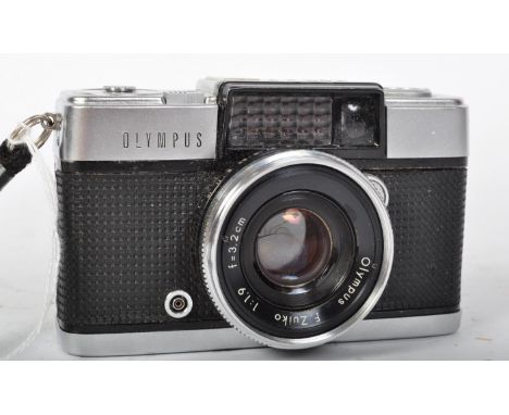 A vintage 20th century Olympus Pen-D 35mm film camera with Olympus F-Zuiko lens Copal-X. Model no. 144347. Measures 11cm leng