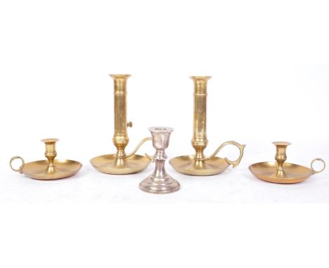 A collection of vintage 20th century brassware comprising of two brass chamber sticks with adjustable heights, two further br