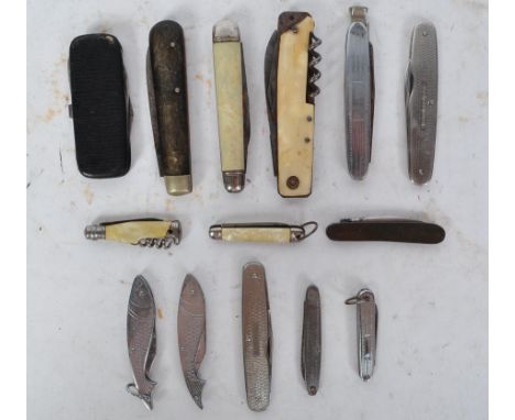 A collection of vintage 20th century pen knives to include fruit knives, swiss army pen knives, pens in the style of fish and