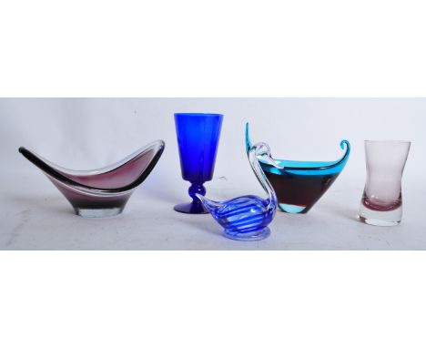 An assortment of mid 20th century retro vintage glass to include a pair of Murano style boat dishes, a Bristol Blue pelican o