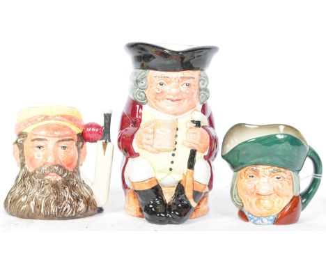 A collection of three vintage 20th century ceramic Royal Doulton toby jug. To include Toby Philpotts RDNo817031, W G Grace D6