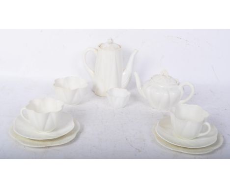A 19th century Victorian Dainty White Shelley porcelain tea service having a foliate shaped edge. Makers mark to the undersid