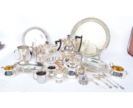 A collection of vintage 20th century silver plate comprising of teapots, tankards, trays, teapots and more. Makers mark to th