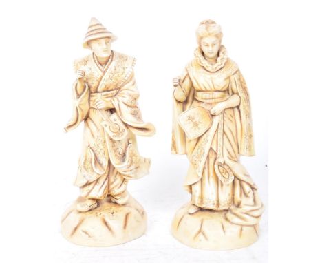 Two vintage 20th century Continental Chinese ceramic figurines portraying a man holding an instrument and a woman holding a f