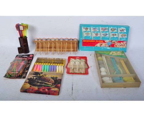 A collection of vintage 20th century Breweriana comprising of London Underground themed cocktail sticks including Euston, Mar