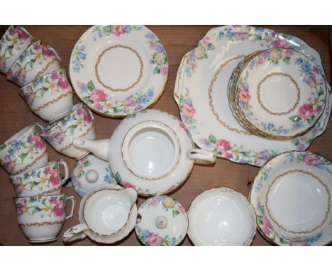 Crown Staffordshire tea ware in the Brendon pattern, pink rose design, to include a teapot, trios and others (Qty).  In good 