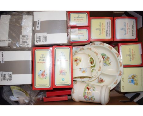 A collection of Royal Doulton 'Bunnykins' collectables to include boxed, Pillar Money Boxes (3) Desk Clock, Name Stand, Chris