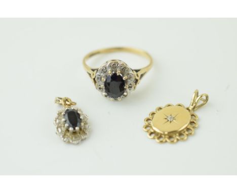 A 9ct yellow gold dress ring, matching pendant together with yellow coloured metal pendant (testing as 9ct gold). Gross weigh