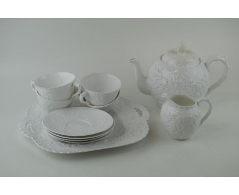 A collection of Spode Savoy Cabbage tea ware to include a teapot, 4 cups, 4 saucers, a milk jug and a cake plate (Qty).  In g