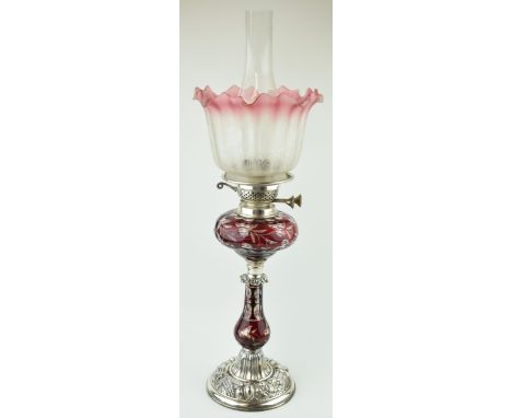 19th century 'Duplex' oil lamp. Cranberry glass stem and bowl. Silver-plated base with acid etched shade. Height 63cm.