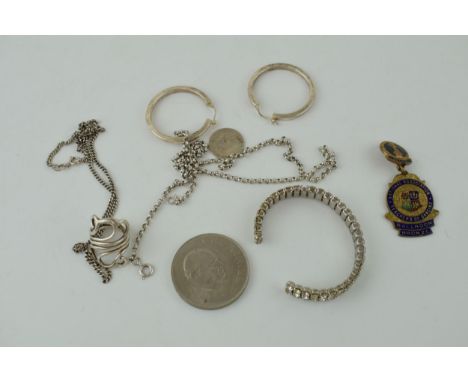 A collection of coins, enamel badges, silver and costume jewellery. Silver weight 32 grams.