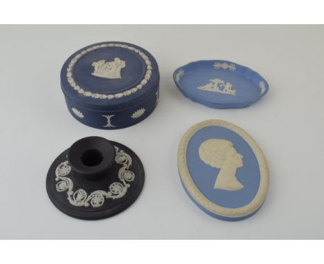 A collection of Wedgwood Jasperware items to include H.R.H. The Princess Anne wall plaque, a dark blue lidded box, diameter 1