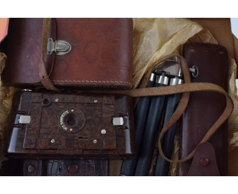 A No.2 'Hawkette' Bakelite camera by Kodak in original leather case together with a period tripod in case and a 'Rolls Razor'