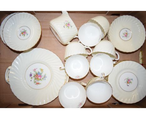 Minton tea service with a floral spray on pale background (Qty).  In good condition with no obvious damage or restoration. Su