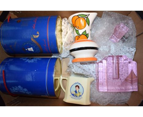 A mixed collection of items to include an Art Deco style oversize perfume bottle in pink glass a/f, two Wade commemorative wh
