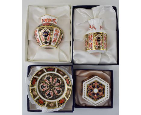 Boxed Royal Crown Derby to include a 1128 Old Imari Viola Vase, an 1128 Primrose Vase, a 1297 trinket and an 1128 10.5cm diam