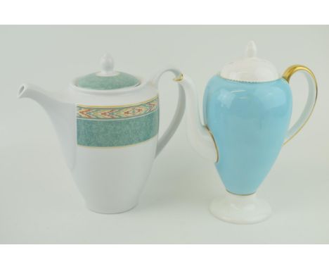 A Wedgwood lidded coffee pot, together with a Wedgwood Home 'Aztec' coffee pot. Height 22cm. (2)  Blue coffee pot of 2nd qual