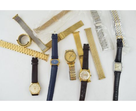 A collection of wristwatches to include a Derrick manual watch, a Seiko, a Services and others with spare straps /  bracelets