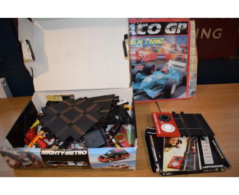 A collection of retro Scalextric Model Motor Racing items to include: 1990s 'Mighty Metro' Track and accessories are present 