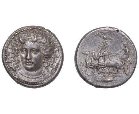 Greek Coinages, Syracuse: Tetradrachm, struck under the Second Democracy, c. 406; signed work of Kimon  Obverse: head of Aret