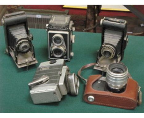 FOUR VARIOUS VINTAGE CAMERAS INCLUDING ROLLOP, KODAK & ZENIT.  ALSO AUTOSET TURRET MOVIE CAMERA 