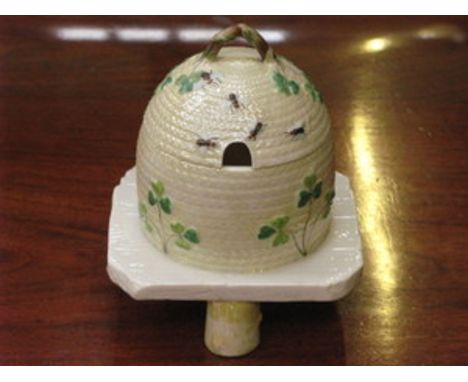 BELLEEK BLACKMARK GLAZED CERAMIC HONEY POT ON STAND 