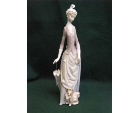 LLADRO GLAZED CERAMIC FIGURINE OF A LADY WITH DOG AND PARASOL, APPROXIMATELY 36cm HIGH 