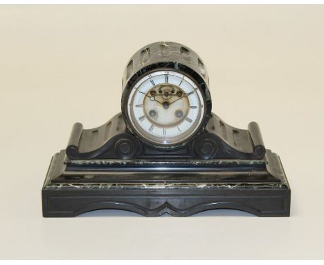 A late 19th century French varigated&nbsp; marble and black slate drum head mantle clock, with eight day movement striking up