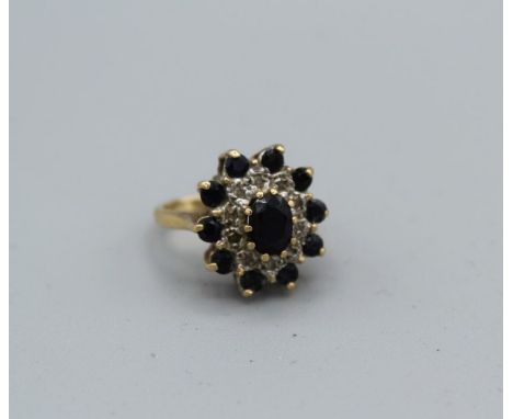 &nbsp;A 9ct gold sapphire and diamond cluster ring, gross weight approximately 4.8gm