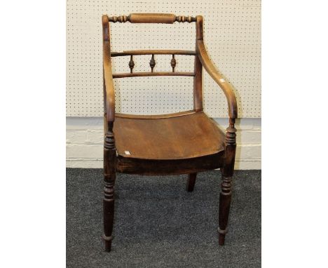 A late 19th century ash and beech Oxford bar back armchair, with downswept arms, solid seat, on ring turned tapering forelegs