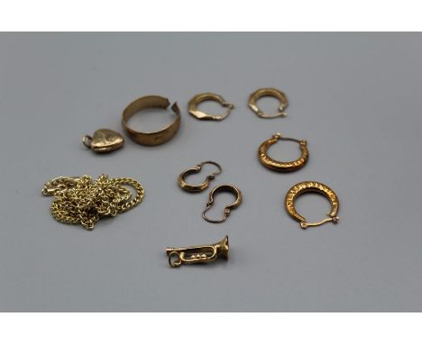 A collection of 9ct gold and yellow metal jewellery, 9ct gold, total weight 11gm, a split shank ring, a trumpet charm, a curb