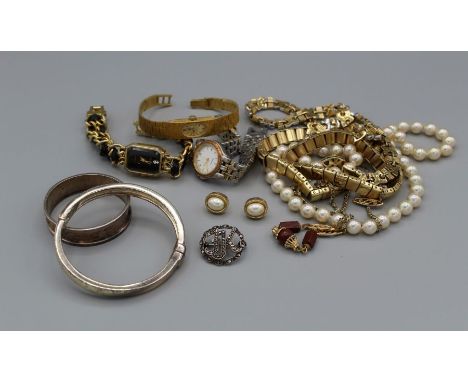 A selection of costume jewellery comprising quality costume necklaces, earrings, three ladies wrist watches, plus a silver an