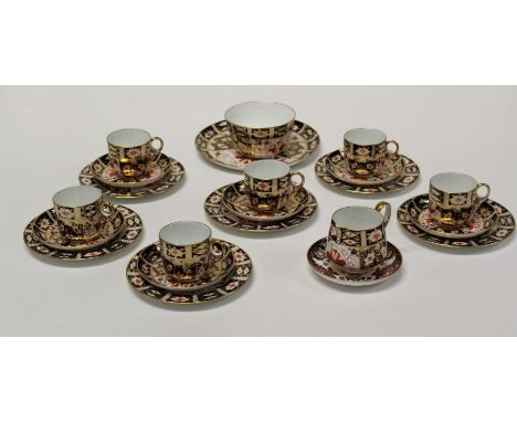 a royal crown derby Old Imari part tea service, comprising six cups, seven saucers, six tea plates, cake plate, cream jug and