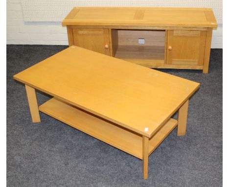 A circa 2012 Laura Ashley light oak entertainment stand/cupboard, 49 x 135 x 44.5cm, together with a two tier coffee table, 4