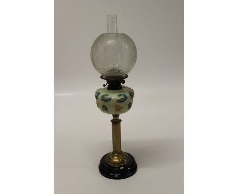 An Edwardian paraffin table lamp with globular etched shade, vaseline reservoir, on brass column and ceramic base, 68cm ( tot