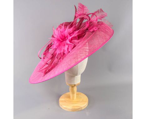 PETER BETTLEY LONDON - Fuchsia pink fascinator, with feather flower and twirl detail, headband and comb fastening, overall wi
