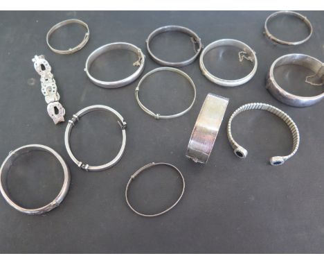 A selection of thirteen silver bangle bracelets approx weight 8 troy oz