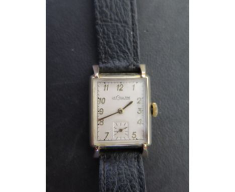 A Gentleman's 10K gold plated Jaeger LeCoultre wristwatch contains a 17 jewel Swiss made 11LO movement marked LeCoultre and V