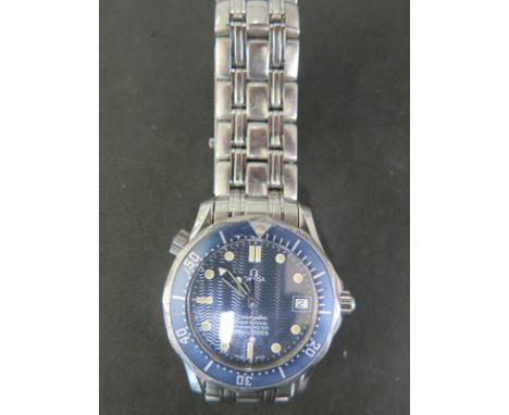 A Gentleman's Omega Seamaster Professional chronometer stainless steel wristwatch with blue bezel, date aperture at 3 o'clock