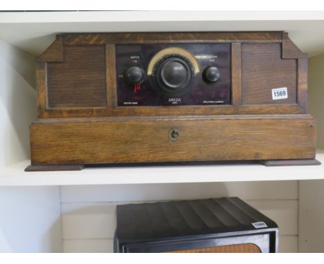 An unusual 1920's/30's oak Arega Mantel Valve Radio - 28cm x 60cm
Condition report: This item is sold as an item of historica