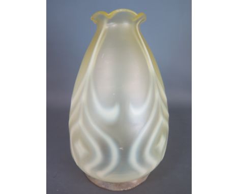 An early 1900'a Vaseline glass lamp shade - Height 17cm - base rim 8.5cm diameter 
Condition report: Chips to base of rim res