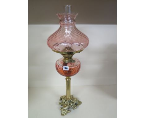 A Cranberry glass Victorian style oil lamp - Height 67cm