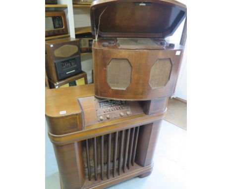 A Philco cabinet valve Radio - circa 1940 - Height 92cm x Width 87cm  and a McMichael Radio Ltd. Wooden Radio Model 135
Condi