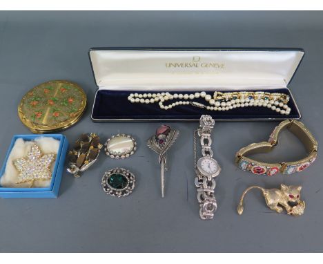 A small quantity of costume jewellery including brooches, Continental pearl necklace, sterling silver cased Rotary ladies wri