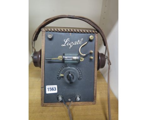 A Liqall Crystal Radio with a Celestion speaker in an oak case - 22cm x 17cm
Condition report: This item is sold as an item o