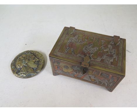 A vintage brass box and coin paperweight 